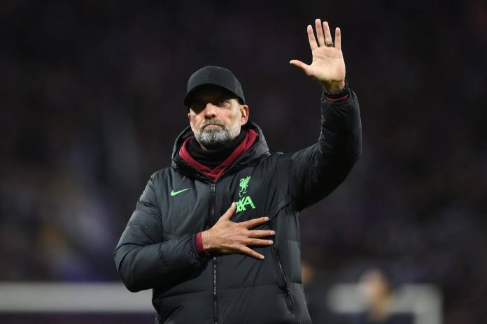 unnamed Klopp waves farewell.