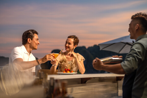 Sunset cocktail at the bar onboard