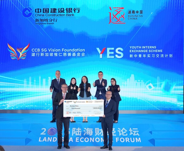 Business China’s CEO Designate, Kwek Poh Heok (back row, 2nd from left), Zhou Tao (back row, leftmost), President of CCB Chongqing Branch witnessed the cheque presentation together with representatives from CCB Singapore, Temasek Trust, and TT Foundation Advisors, as Business China’s Director Dr. Fong Yeow Wah receives the cheque on behalf of the YES programme. Business China’s CEO Designate, Kwek Poh Heok (back row, 2nd from left), Zhou Tao (back row, leftmost), President of CCB Chongqing Branch witnessed the cheque presentation together with representatives from CCB Singapore, Temasek Trust, and TT Foundation Advisors, as Business China’s Director Dr. Fong Yeow Wah receives the cheque on behalf of the YES programme.