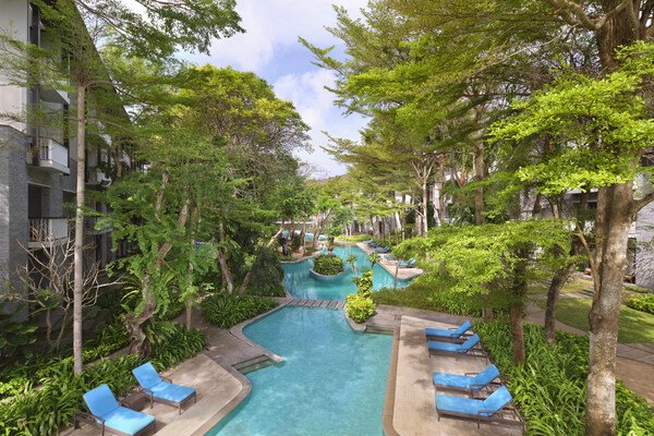 The 97-meter lagoon pool at Courtyard by Marriott Bali Nusa Dua Resort offers the perfect setting to unwind and embrace tropical serenity.