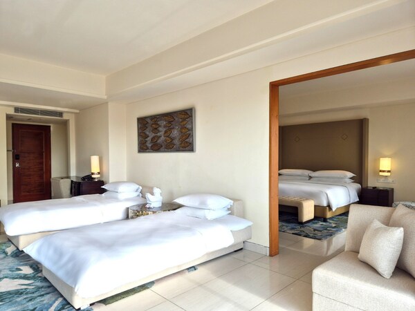 1 Bedroom Larger Family Suite, 1 King, Sofa Bed, Garden View, Garden Level, Terrace (Larger Family Suite) at Sheraton Bali Kuta Resort 1 Bedroom Larger Family Suite, 1 King, Sofa Bed, Garden View, Garden Level, Terrace (Larger Family Suite) at Sheraton Bali Kuta Resort