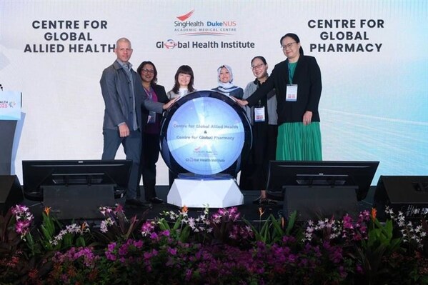 (From left) Prof Paul Pronyk, Co-Director, SingHealth Duke-NUS Global Health Institute, Ms Jeyamany Ruth Jacob, Chair, Centre for Global Allied Health, Adj A/Prof Tan Bee Yee, Group Chief Allied Health Professional, SingHealth, Guest of Honour Mdm Rahayu Mahzam, Minister of State, Ministry of Digital Development and Information & Ministry of Health, A/Prof Lita Chew, Group Chief Pharmacy, SingHealth, and Dr Vivianne Shih, Chair, Centre for Global Pharmacy, at the launch of the two new Centres (From left) Prof Paul Pronyk, Co-Director, SingHealth Duke-NUS Global Health Institute, Ms Jeyamany Ruth Jacob, Chair, Centre for Global Allied Health, Adj A/Prof Tan Bee Yee, Group Chief Allied Health Professional, SingHealth, Guest of Honour Mdm Rahayu Mahzam, Minister of State, Ministry of Digital Development and Information & Ministry of Health, A/Prof Lita Chew, Group Chief Pharmacy, SingHealth, and Dr Vivianne Shih, Chair, Centre for Global Pharmacy, at the launch of the two new Centres