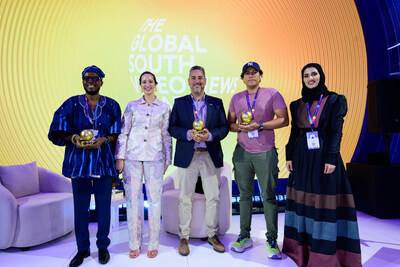 Winners of the Global South Video News Awards with the host of the ceremony. Left to right: Ernest Dela Aglanu, Mai Maxwell (host), Maxi Jonas, Enrique Ortiz, Shahd Alabdouli (Accepting on behalf of Masoud Al Jarousha) Winners of the Global South Video News Awards with the host of the ceremony. Left to right: Ernest Dela Aglanu, Mai Maxwell (host), Maxi Jonas, Enrique Ortiz, Shahd Alabdouli (Accepting on behalf of Masoud Al Jarousha)