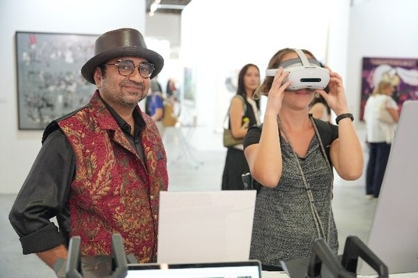 Art enthusiasts explore digital exhibitions of the CGTN Art Series at ART SG in Singapore, January 23, 2026. /CGTN Art enthusiasts explore digital exhibitions of the CGTN Art Series at ART SG in Singapore, January 23, 2026. /CGTN