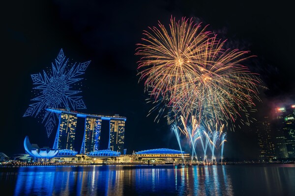 A dazzling burst of fireworks and drones lit up the night, as the Disney Adventure sky show soared to fan-favorite tune, “Let It Go” A dazzling burst of fireworks and drones lit up the night, as the Disney Adventure sky show soared to fan-favorite tune, “Let It Go”