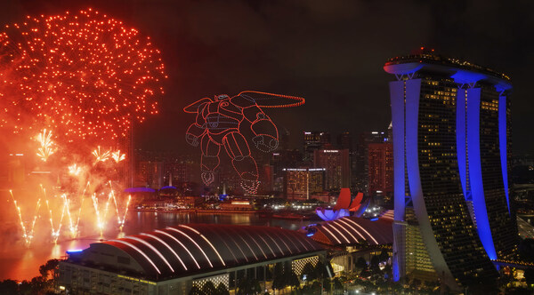 A highlight of the evening was undoubtedly when the fireworks and drones lit up to reveal a show display inspired by San Fransokyo Street – one of the seven themed areas onboard the Disney Adventure A highlight of the evening was undoubtedly when the fireworks and drones lit up to reveal a show display inspired by San Fransokyo Street – one of the seven themed areas onboard the Disney Adventure