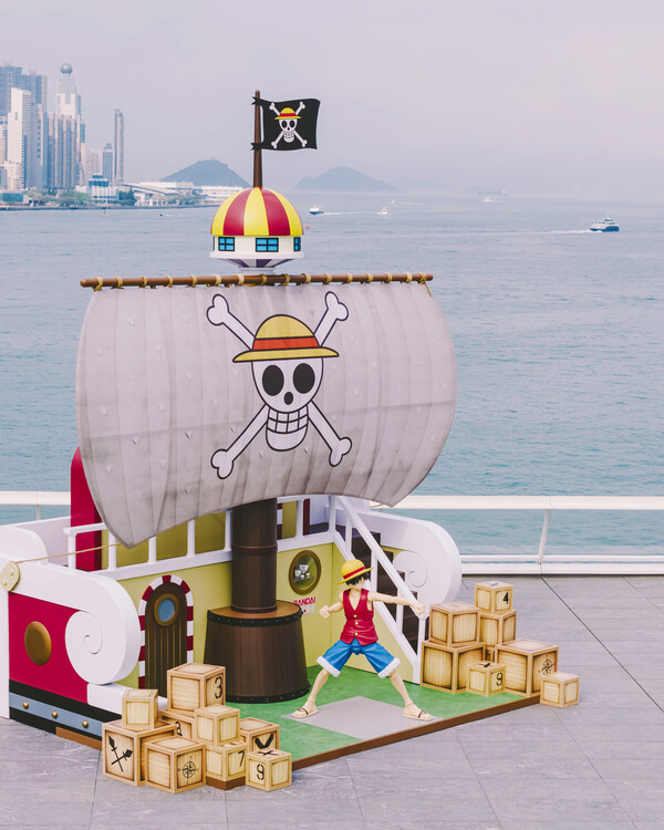 The ONE PIECE themed zone at Ocean Terminal Deck features a 6 metre tall pirate ship inspired by the Going Merry, alongside Gear 5 Luffy and Egghead Arc themed photo spots set against panoramic harbour views