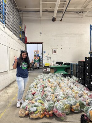 Colleague volunteering at a local food bank in Toronto.